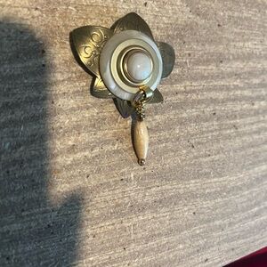 Elegant Gold and Cream Floral Brooch